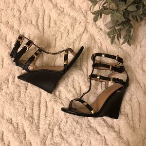 Black and gold studded wedges